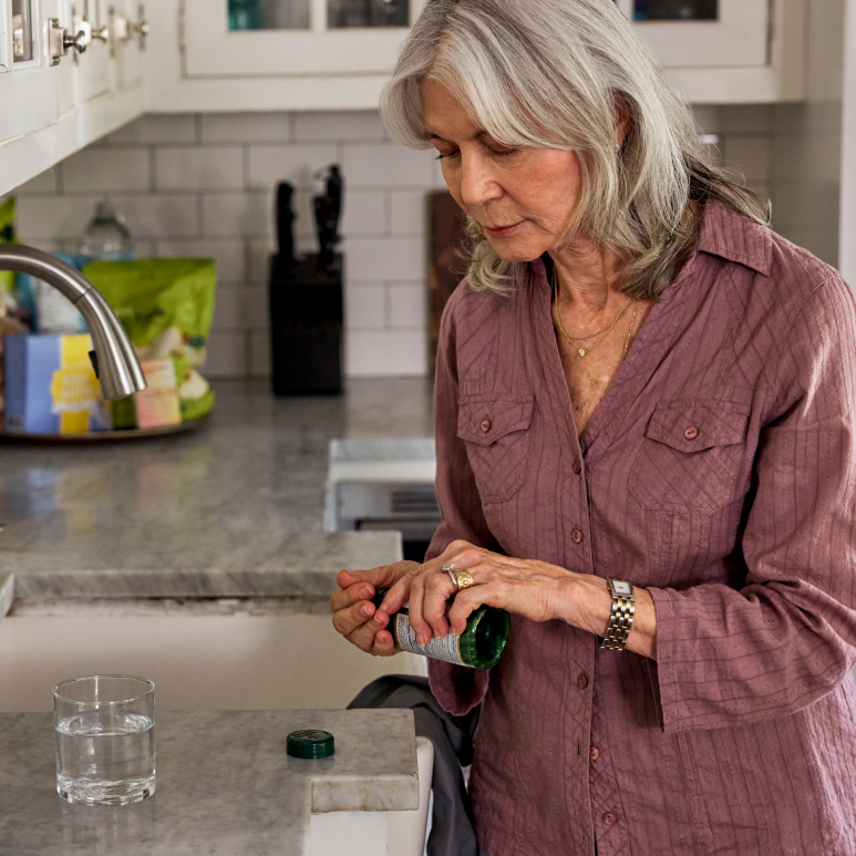 Woman taking vitamins