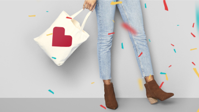 Person holding CVS tote bag