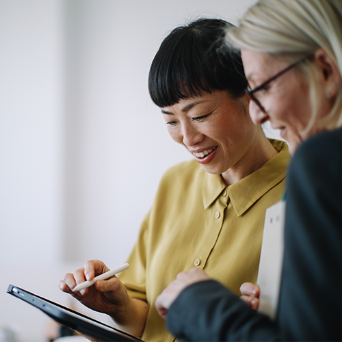 two women on tablet